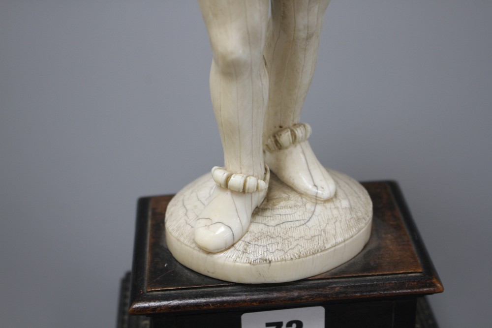 A 19th century Dieppe carved ivory figure of a 17th century gentleman, standing and wearing a ruff colour, height 30cm,